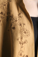 botanical embroidery over coat