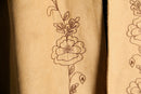 botanical embroidery over coat