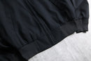 1990s–00s epauletted black blouson jacket