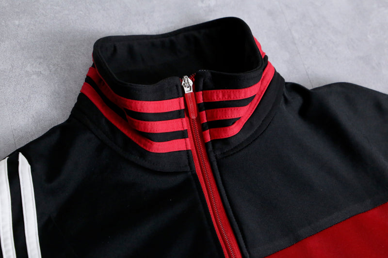 “Re:make” black×red many line track jacket