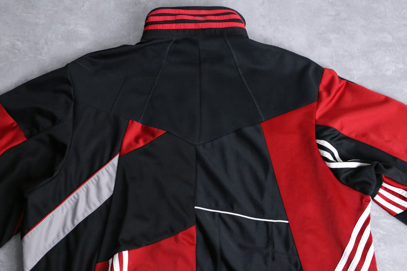 “Re:make” black×red many line track jacket