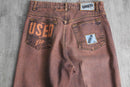 faded brown logo design denim pants