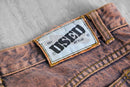 faded brown logo design denim pants