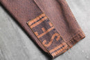 faded brown logo design denim pants