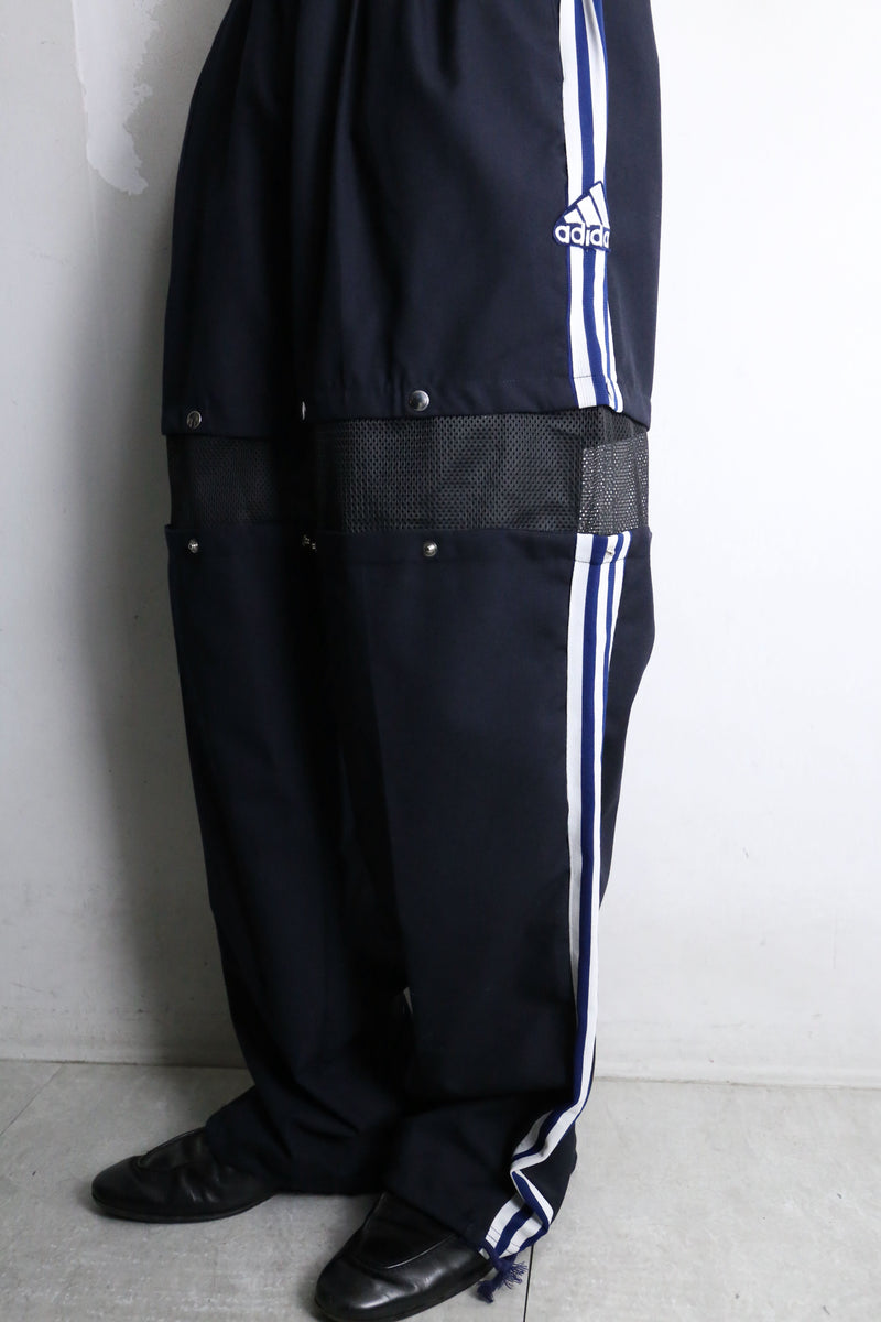 "Re:make" track × slacks layered mesh pants