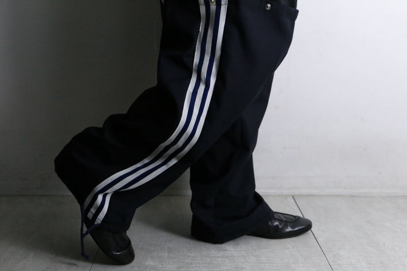 "Re:make" track × slacks layered mesh pants