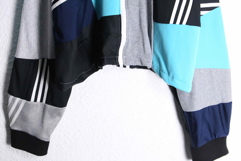 "Re:make" random patchwork blue track jacket