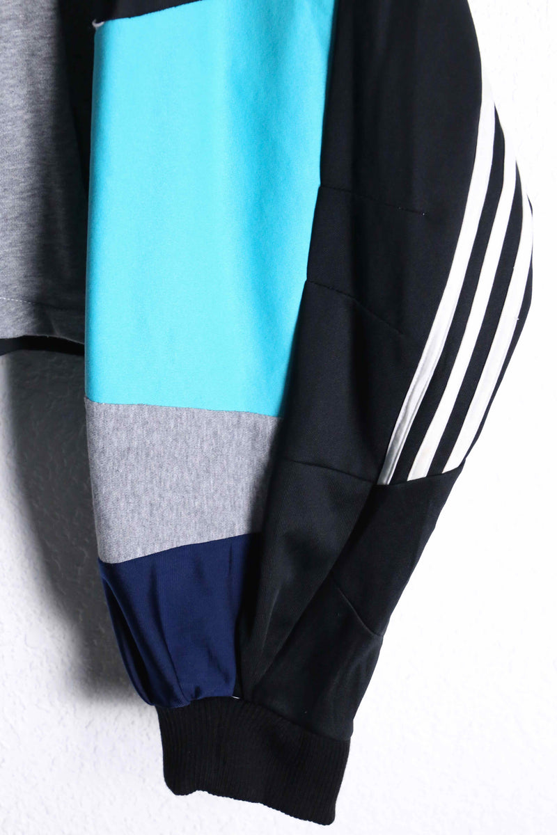 "Re:make" random patchwork blue track jacket