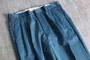 blue poly gabardine pleated slacks