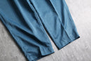blue poly gabardine pleated slacks