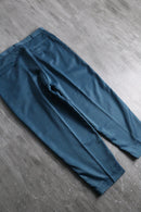 blue poly gabardine pleated slacks