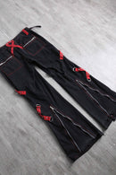 “TRIPP NYC”black cross strap flare pants
