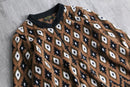 “Bob Mackie” geometric fleece half zip pullover