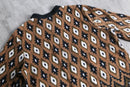 “Bob Mackie” geometric fleece half zip pullover