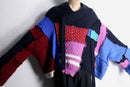 “Re:make” multi knit patchwork sweater