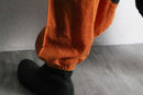 warm tone abstract design sarouel pants