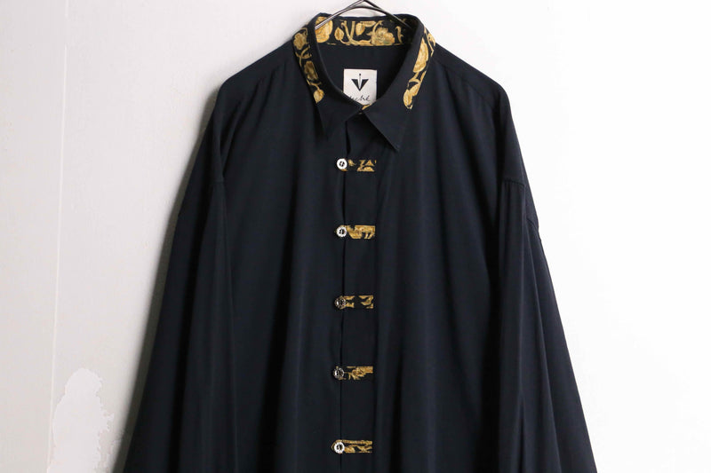 gold flower collar black drape shirt