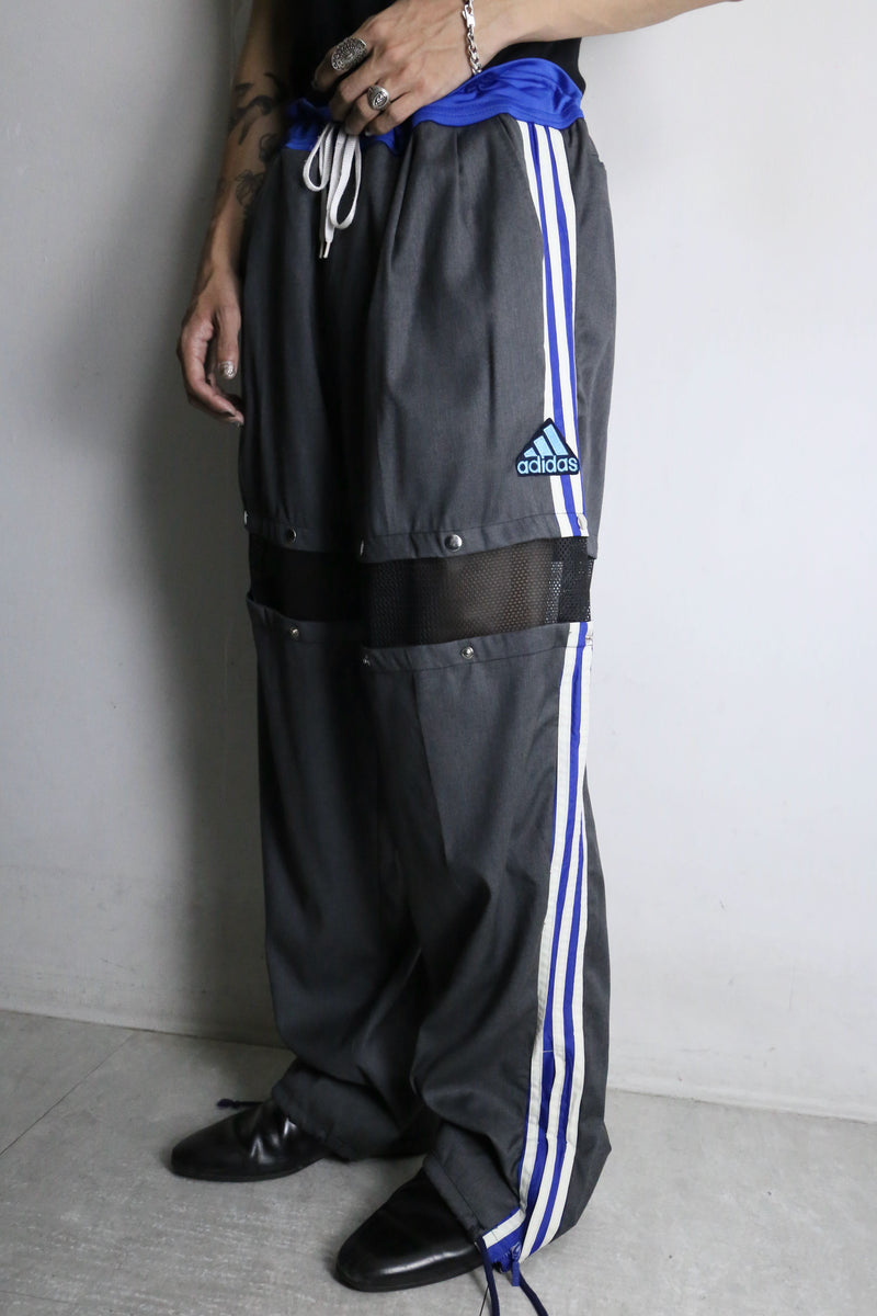 "Re:make" track × slacks layered mesh pants