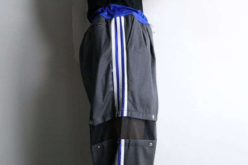 "Re:make" track × slacks layered mesh pants