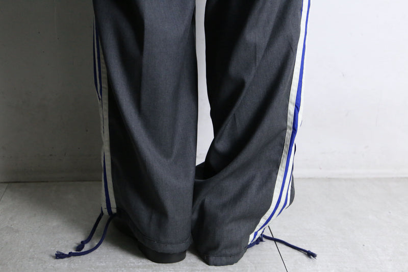 "Re:make" track × slacks layered mesh pants