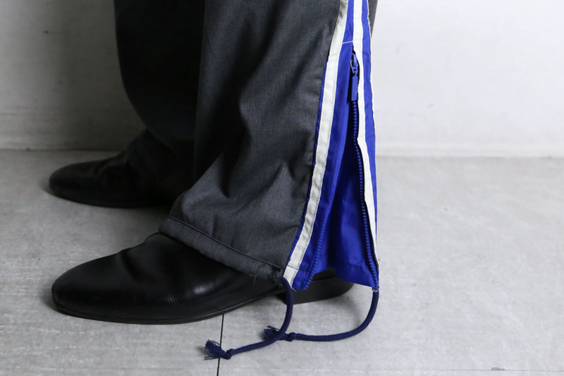 "Re:make" track × slacks layered mesh pants