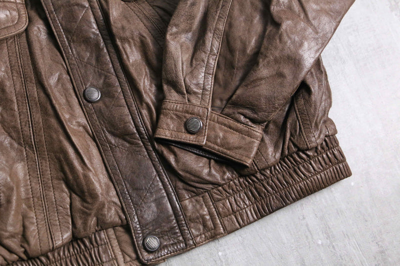 good aging stand collar brown leather jacket