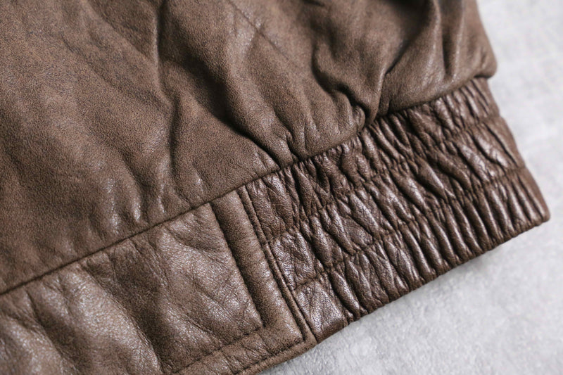 good aging stand collar brown leather jacket