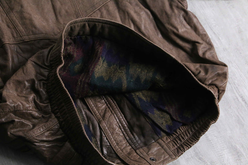 good aging stand collar brown leather jacket