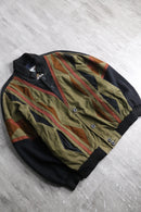 leather × knit geometric patterns blouson