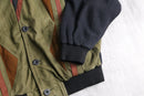 leather × knit geometric patterns blouson