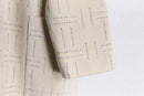 geometric stitch design zip coat