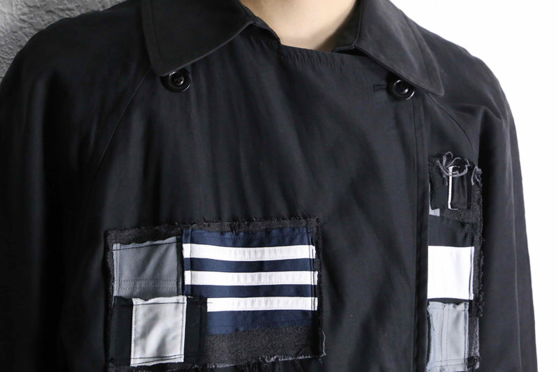 ''Re:make'' patchwork double long coat
