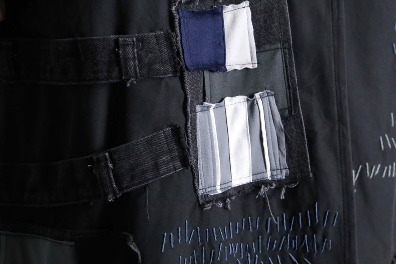 ''Re:make'' patchwork double long coat