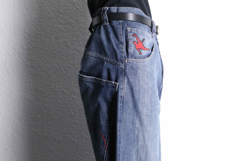 red flow wide denim pants