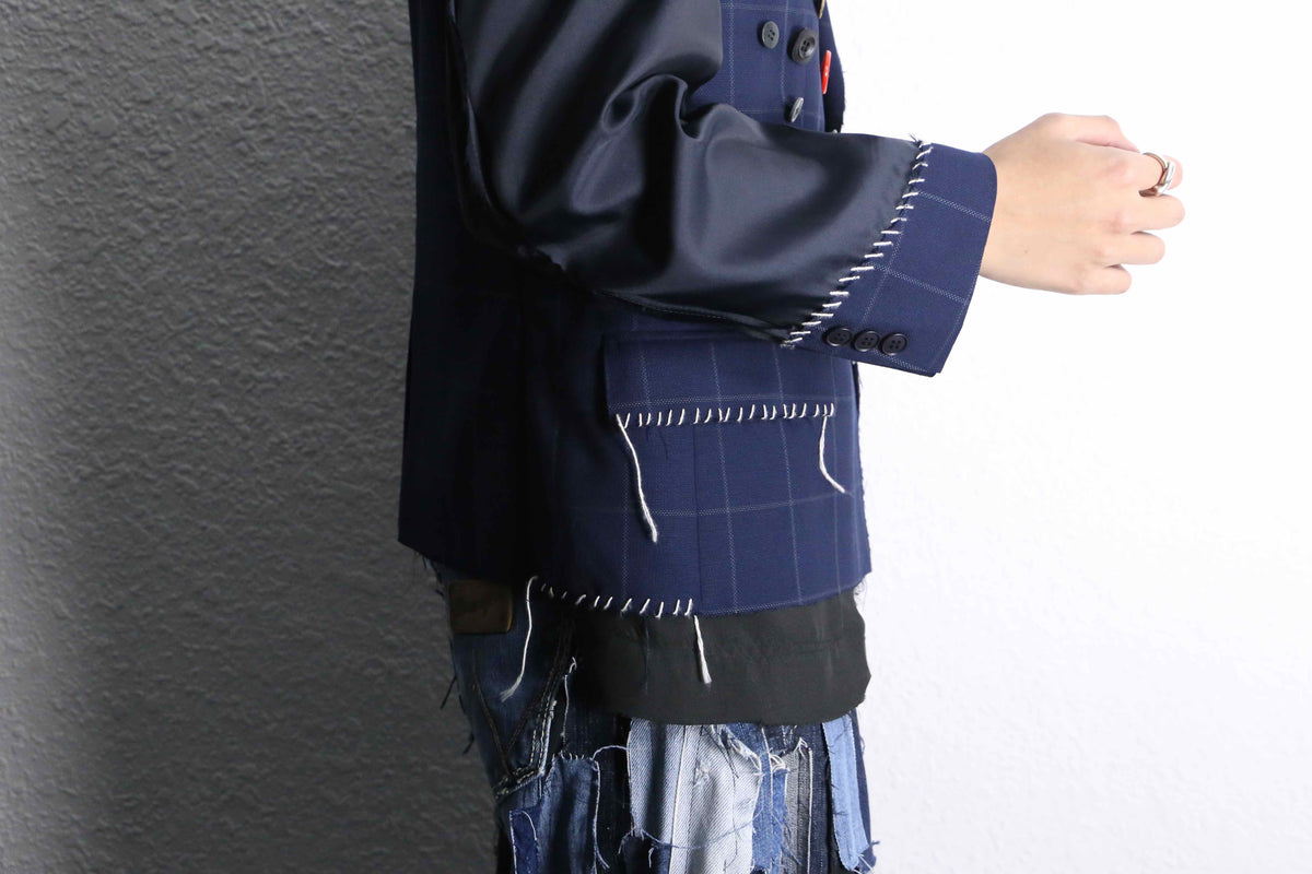 Re:make” button art stitch docking tailored jacket