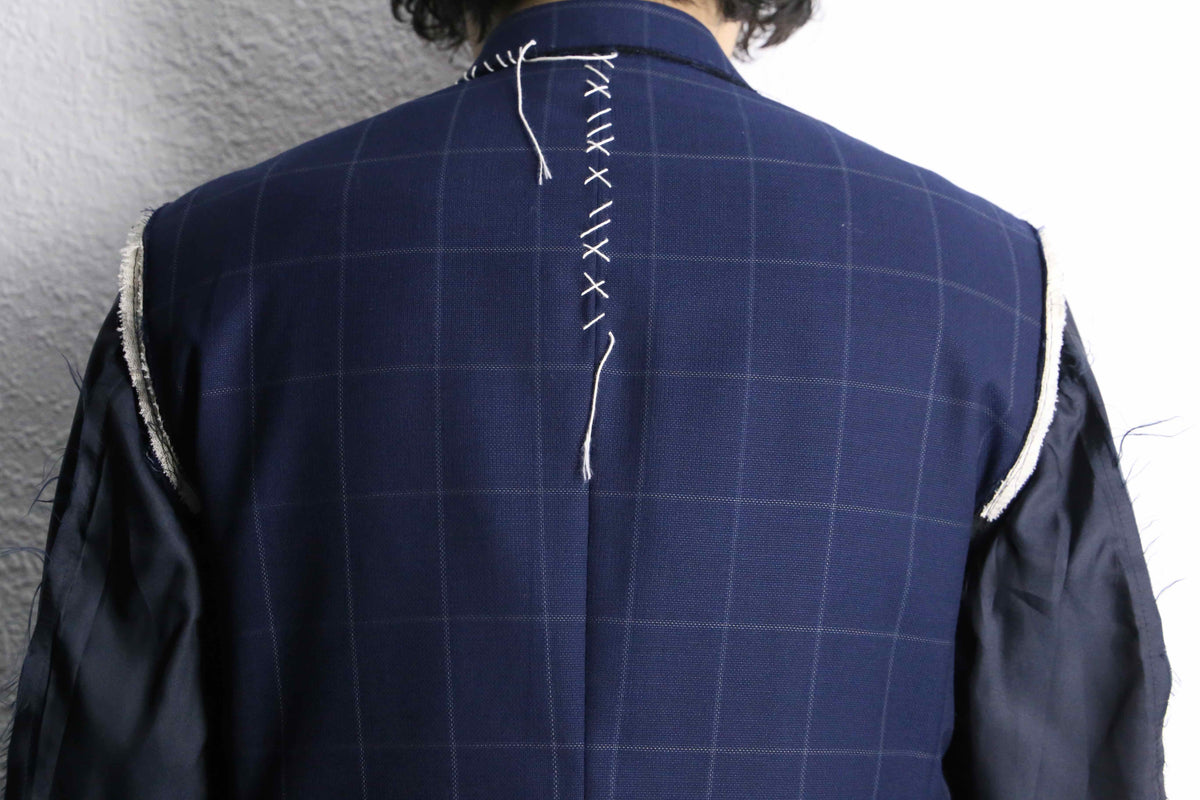 Re:make” button art stitch docking tailored jacket