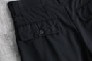black two-tuck wide tapered trousers
