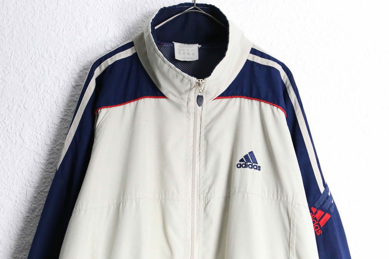 "adidas" multi color raglan sleeve track jacket