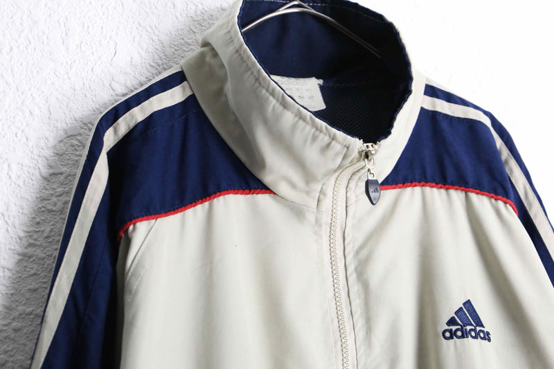 "adidas" multi color raglan sleeve track jacket