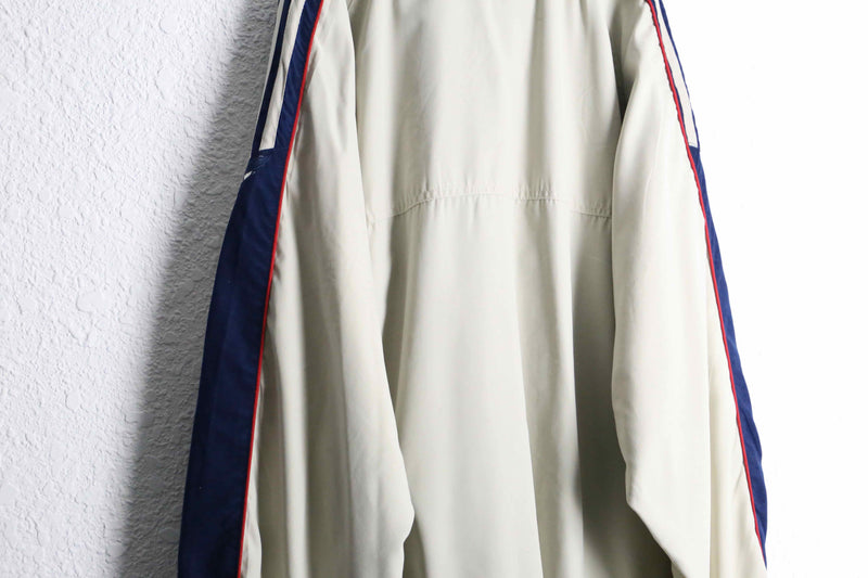 "adidas" multi color raglan sleeve track jacket