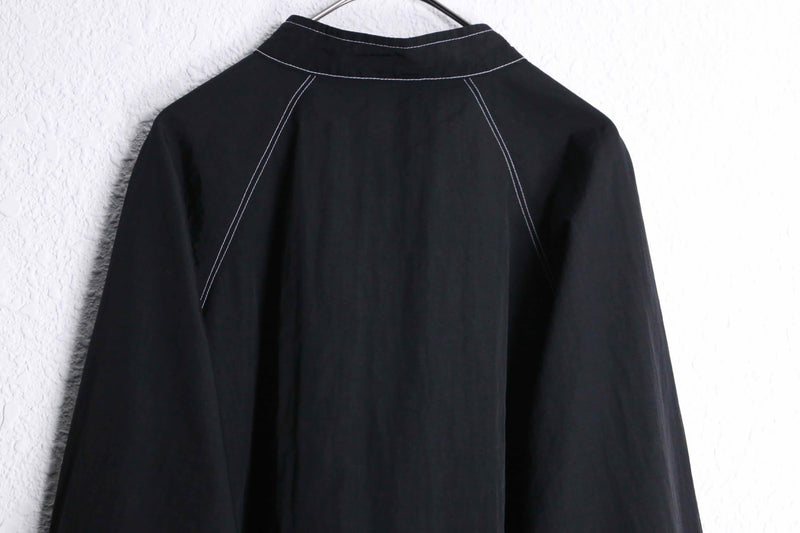 black short length nylon zip up jacket