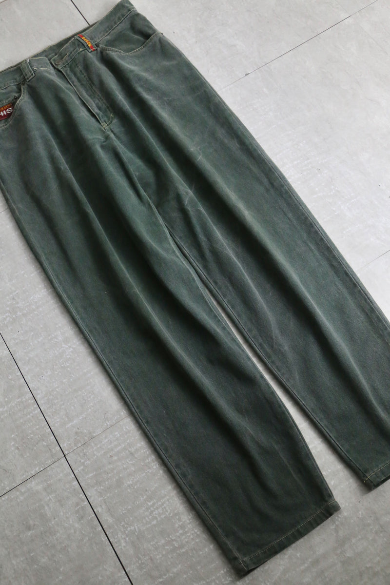 fade green wide tapered silhouette denim