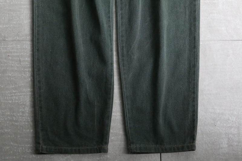 fade green wide tapered silhouette denim