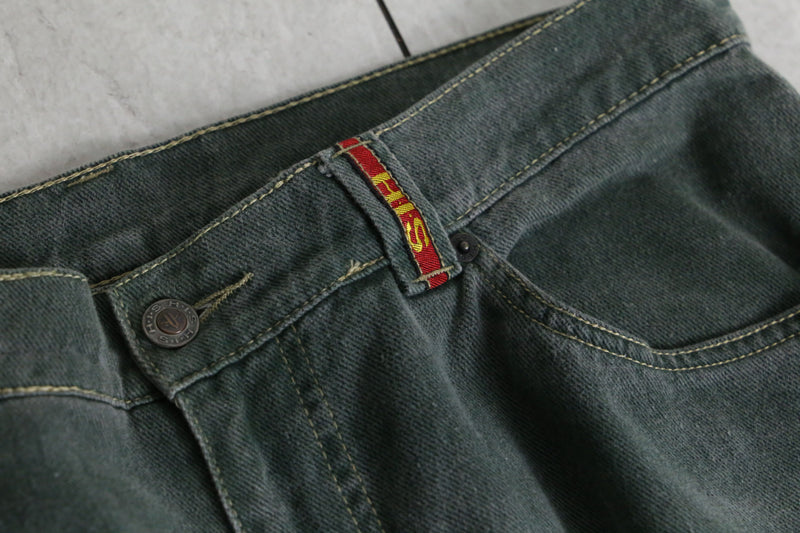 fade green wide tapered silhouette denim