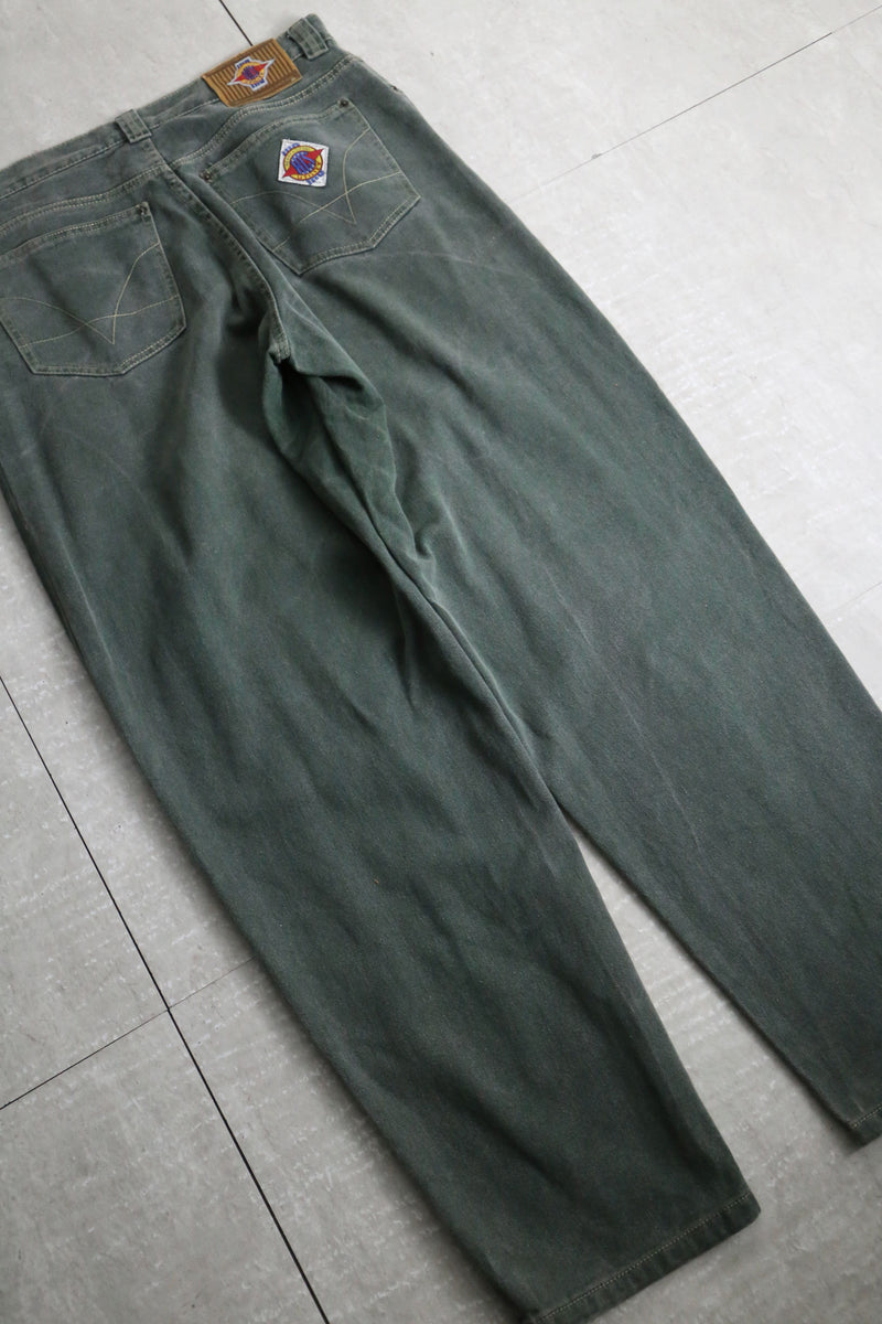 fade green wide tapered silhouette denim