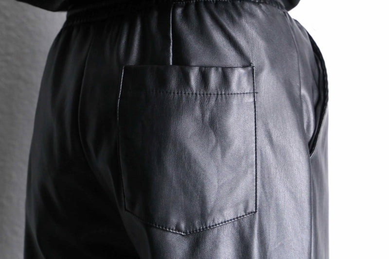 black fake leather wide straight pants