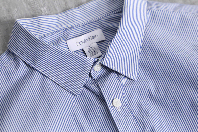 “Calvin Klein” blue stripe shirt