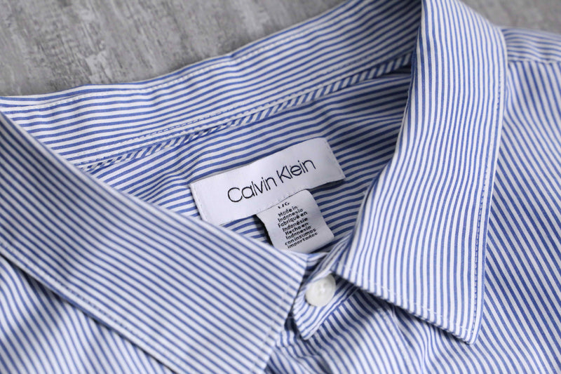 “Calvin Klein” blue stripe shirt