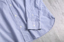 “Calvin Klein” blue stripe shirt