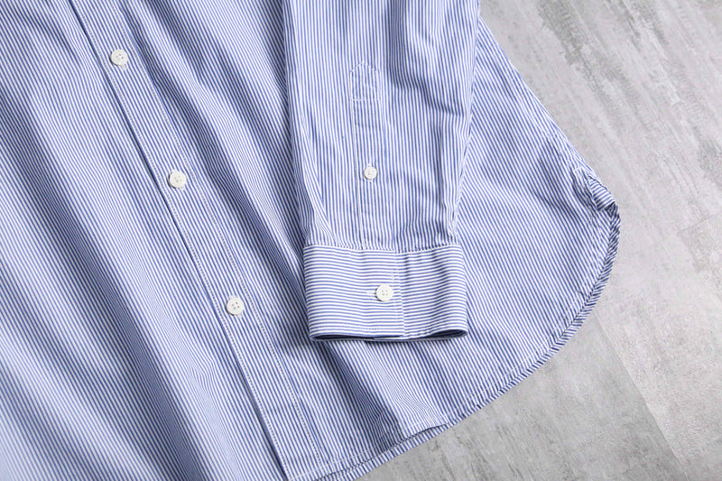 “Calvin Klein” blue stripe shirt